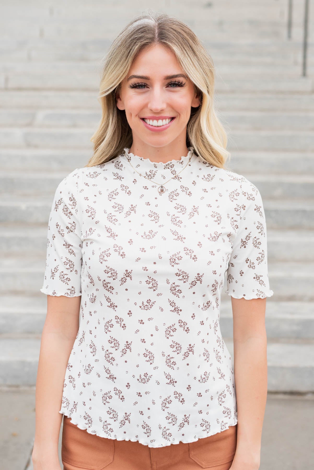 Ivory floral top with a high neck