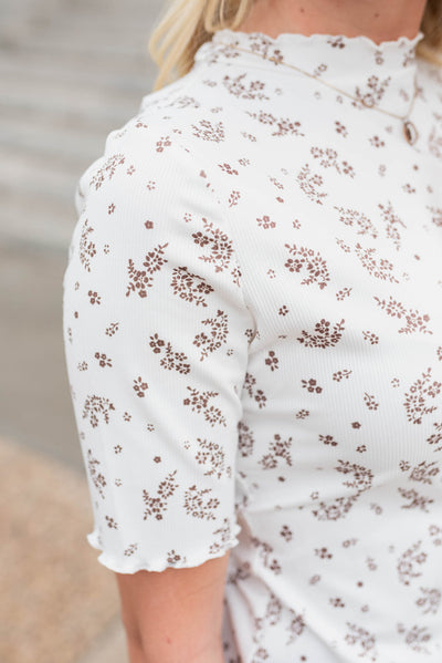 Close up of the ivory floral top