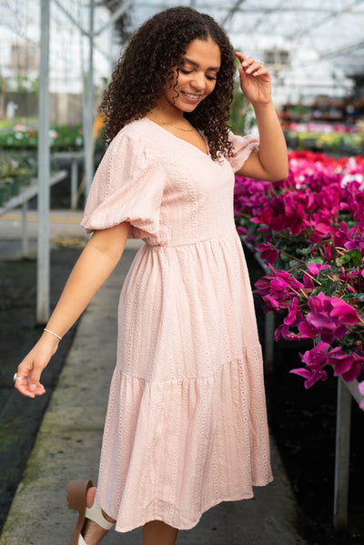 Side view of the blush lace dress