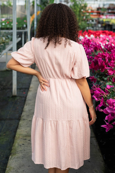 Back view of the blush lace dress