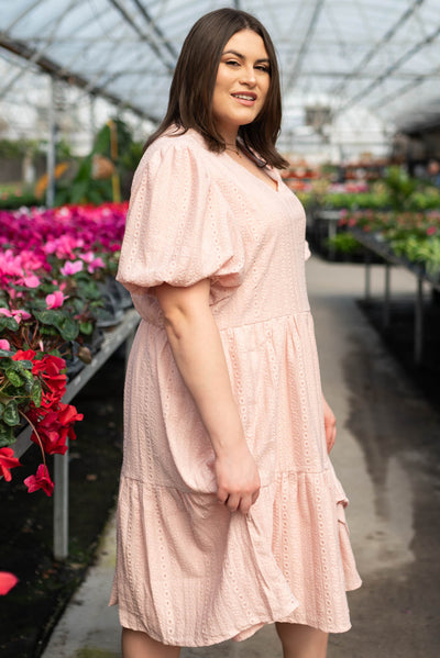 Side view of the blush lace dress