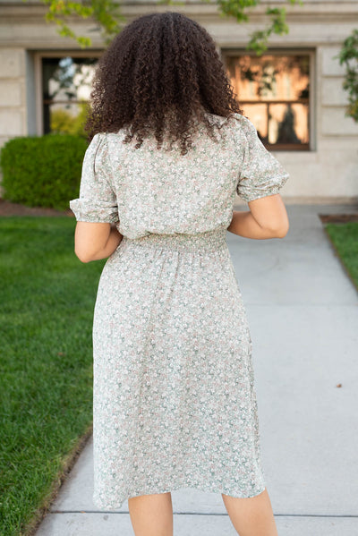 Back view of the olive floral midi dress