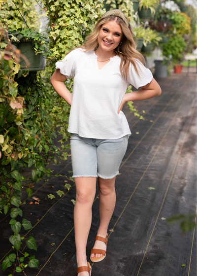 Short sleeve white ruffle blouse