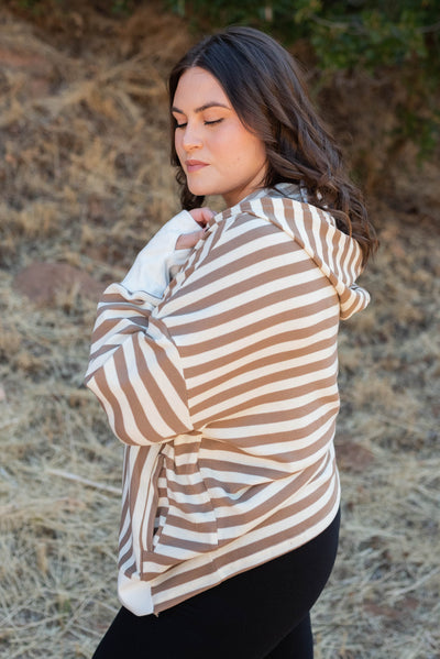 Side view of the brown stripe pullover with ivory trim