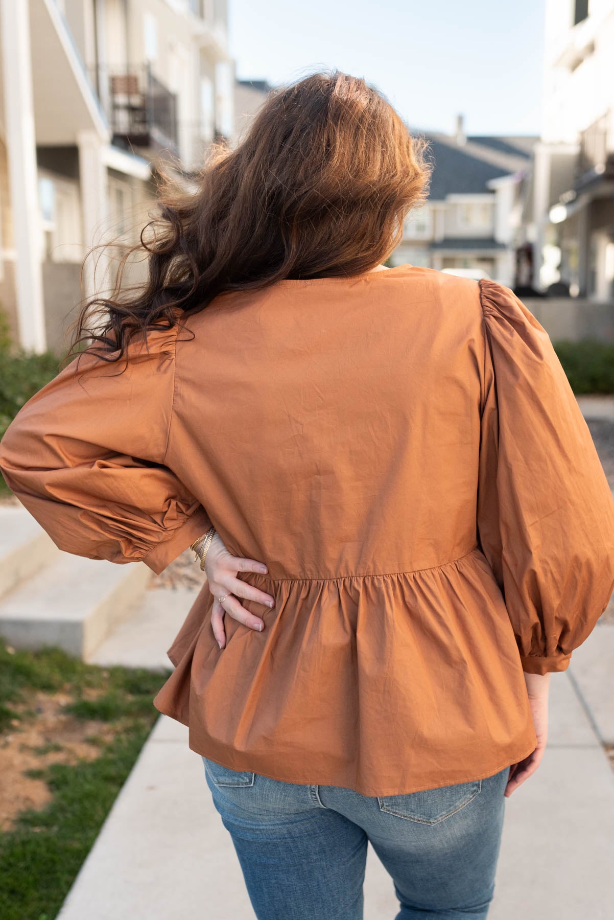 Back view of the toffee bow top