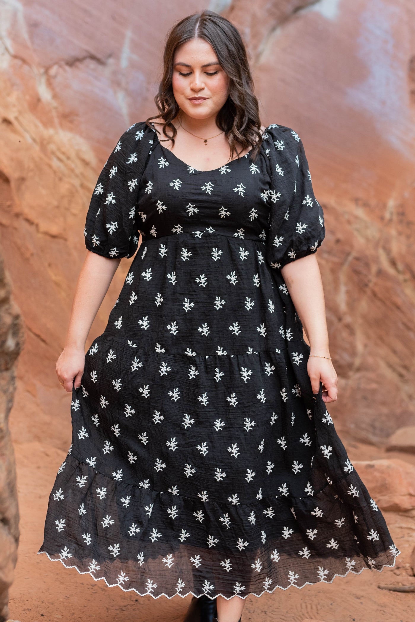 Ivory flowers on the plus size black floral tiered dress