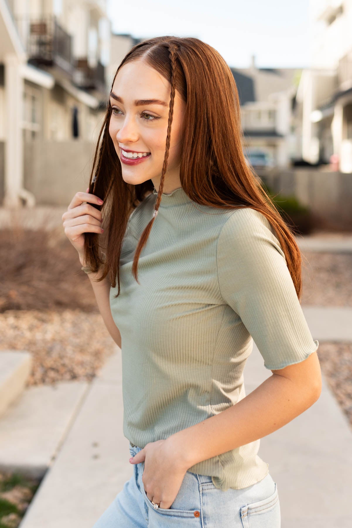 Side view of the sage textured knit top