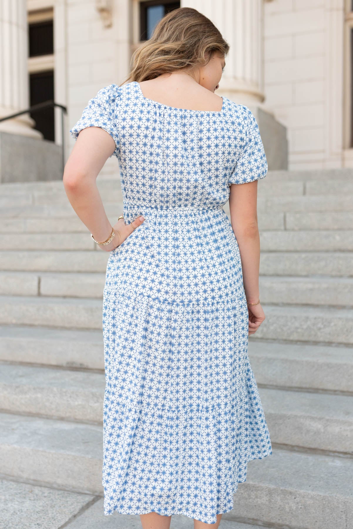 Back view of the blue patterened dress