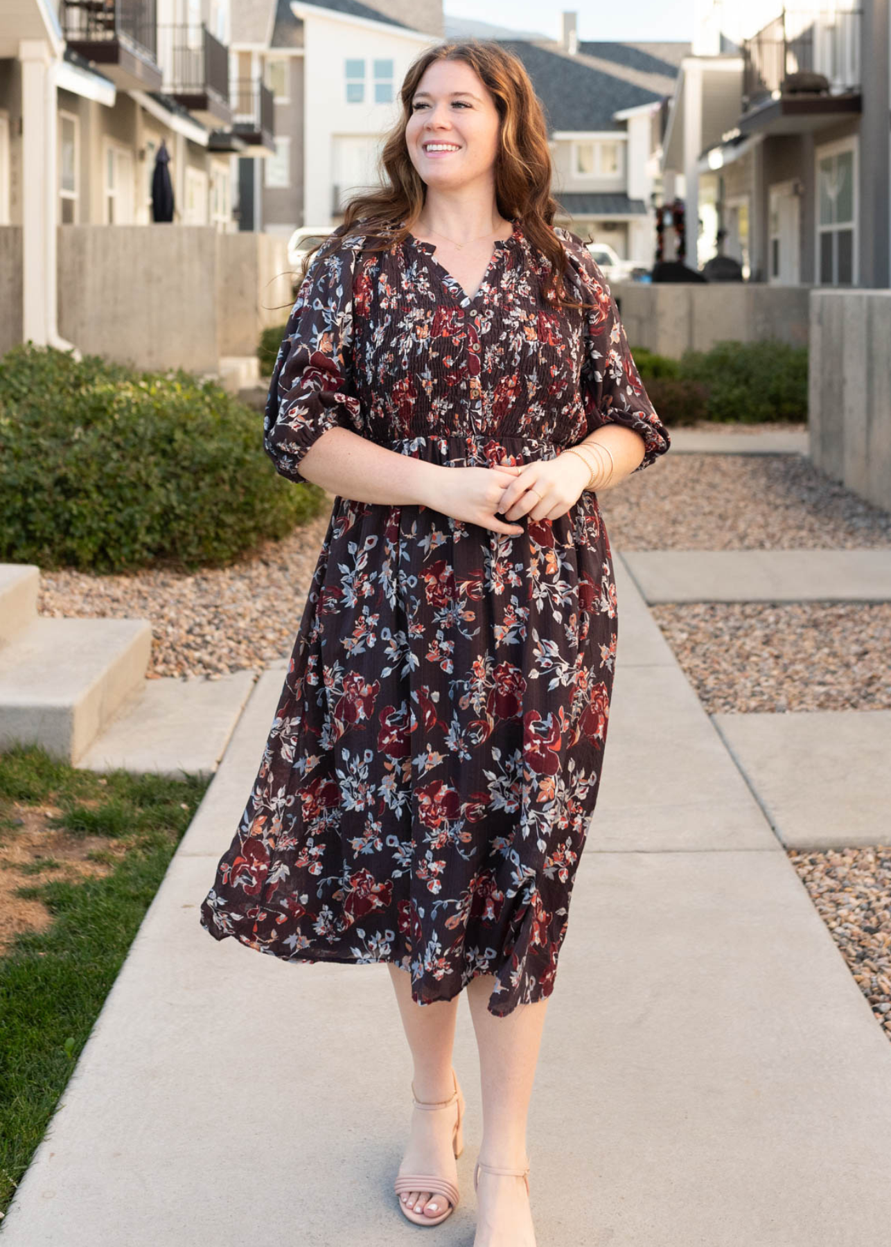 Button up bodice on the plus size dark plum floral dress