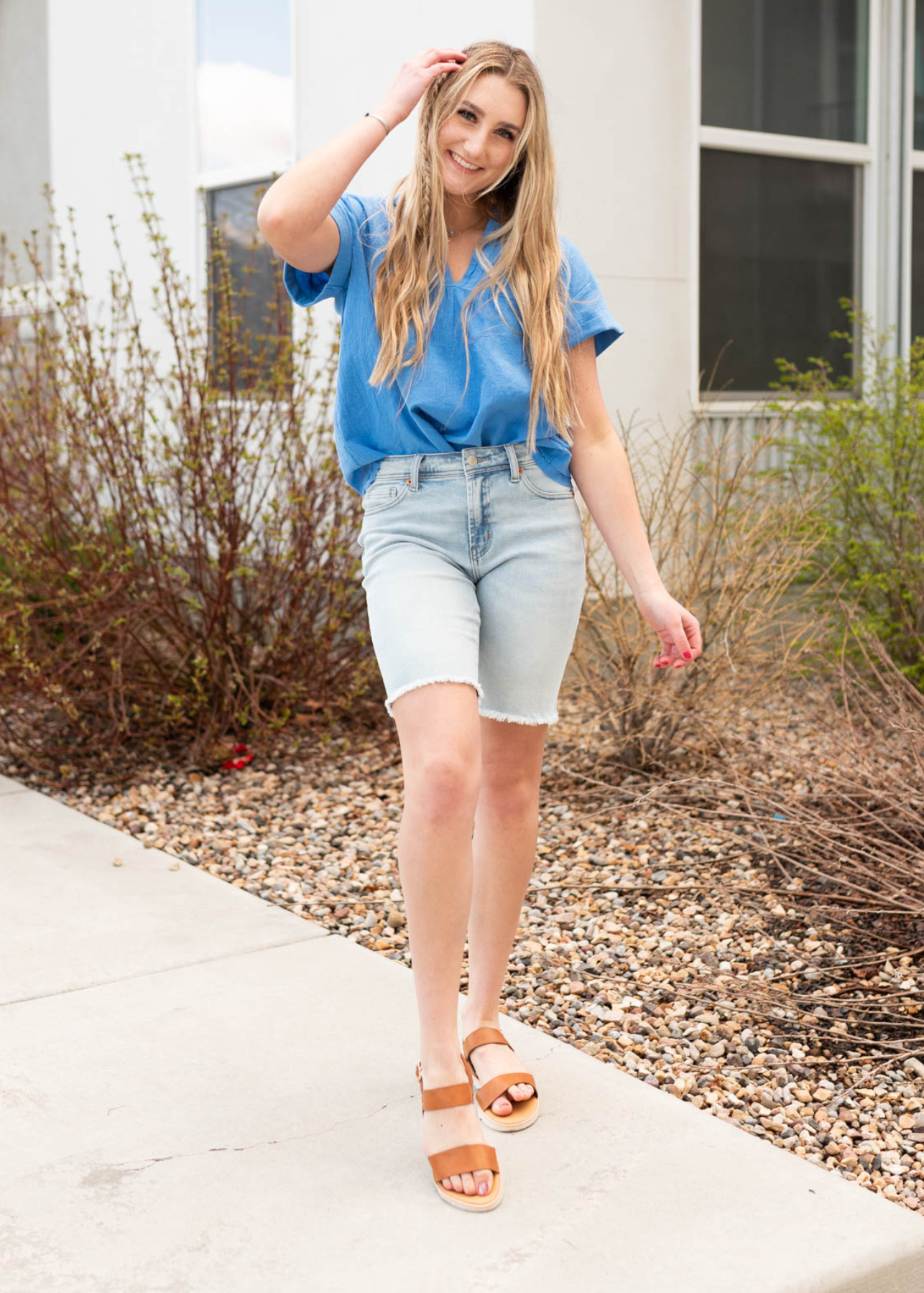 Front view of the blue v-neck top