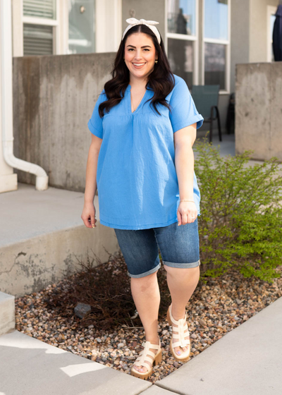 Blue v-neck top with short sleeves