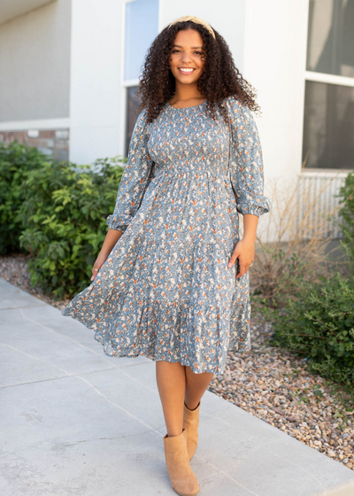 Blue floral smocked dress with 3/4 sleeves