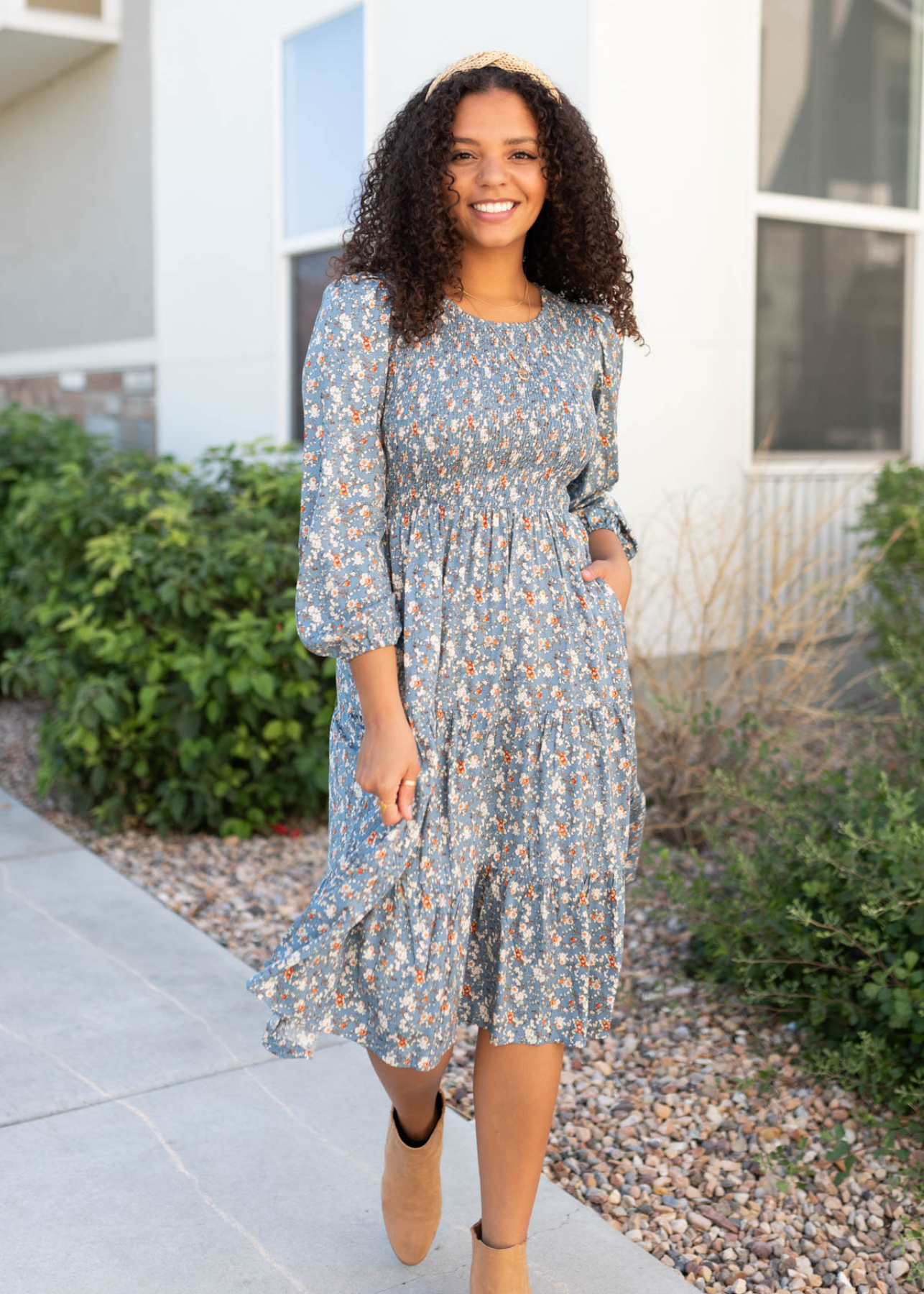 Front view of the blue floral smocked dress