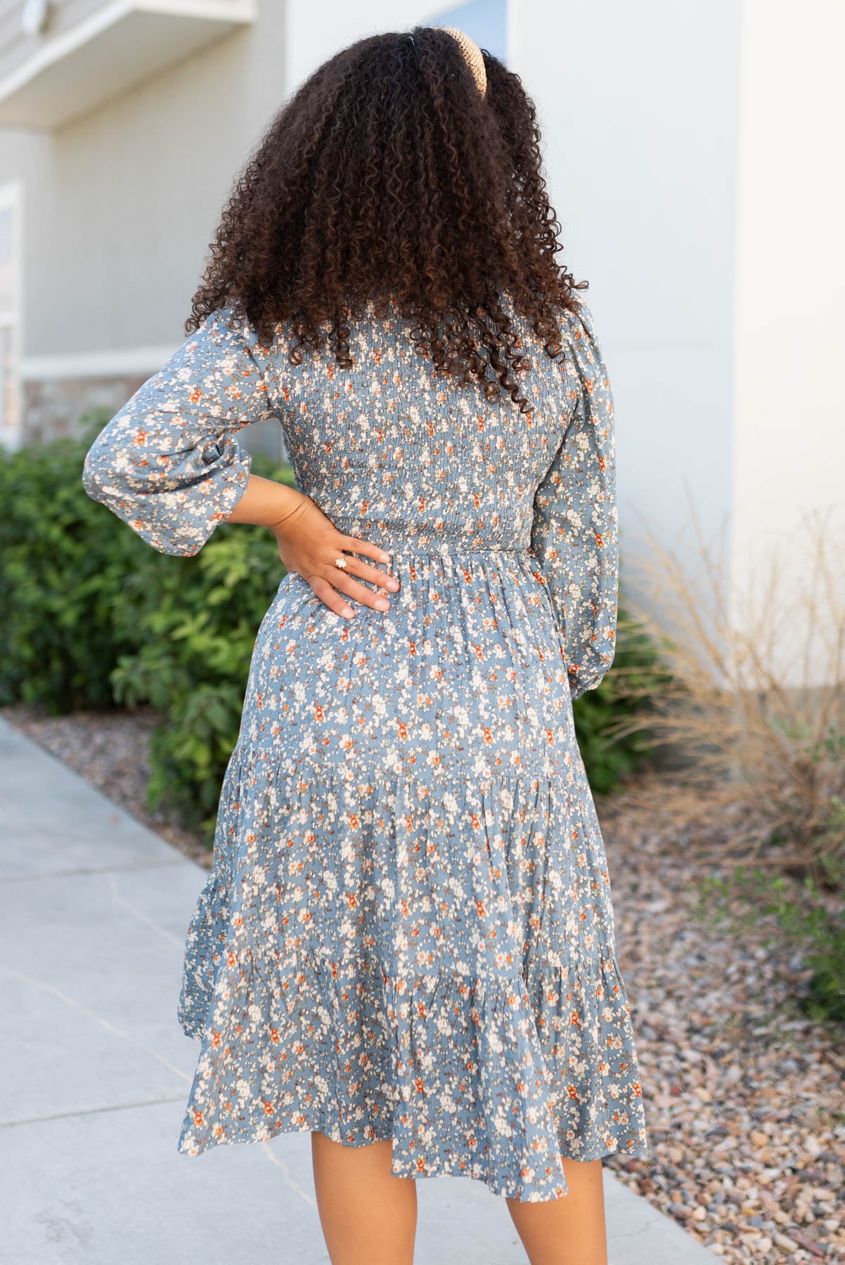 Back view of the blue floral smocked  dress