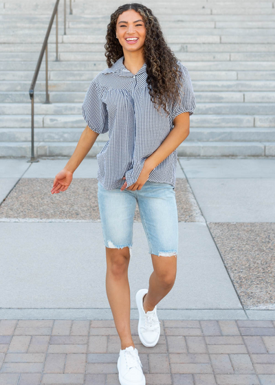 Black plaid collared top with short sleeves