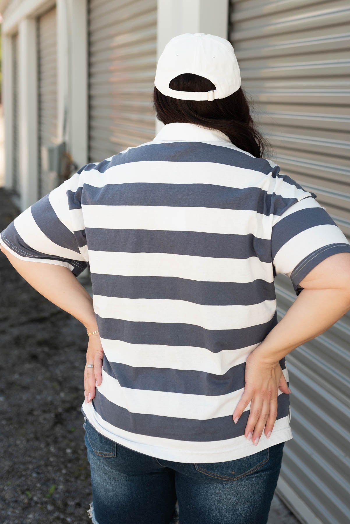 Back view of the plus size navy polo top