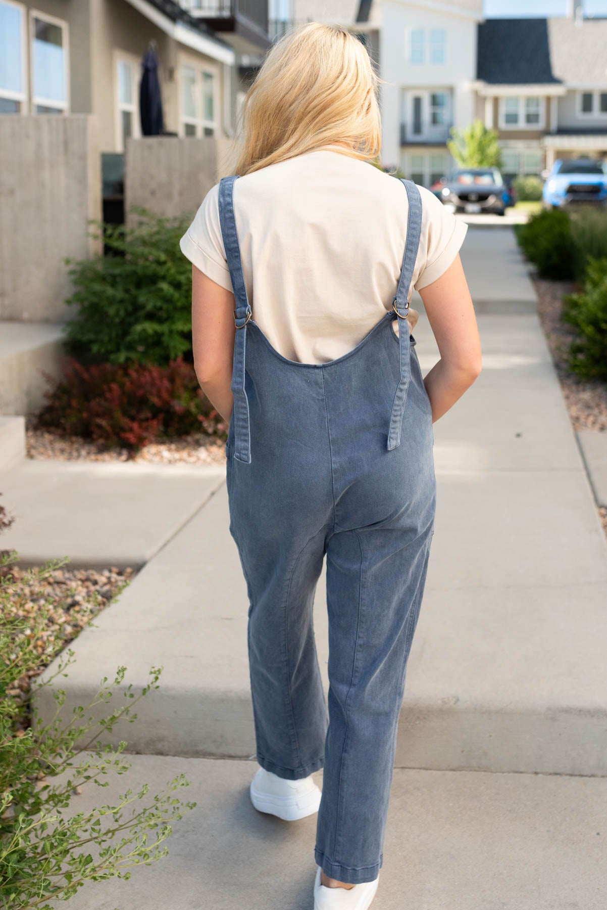 Back view of the blueberry denim overalls with adjustable straps