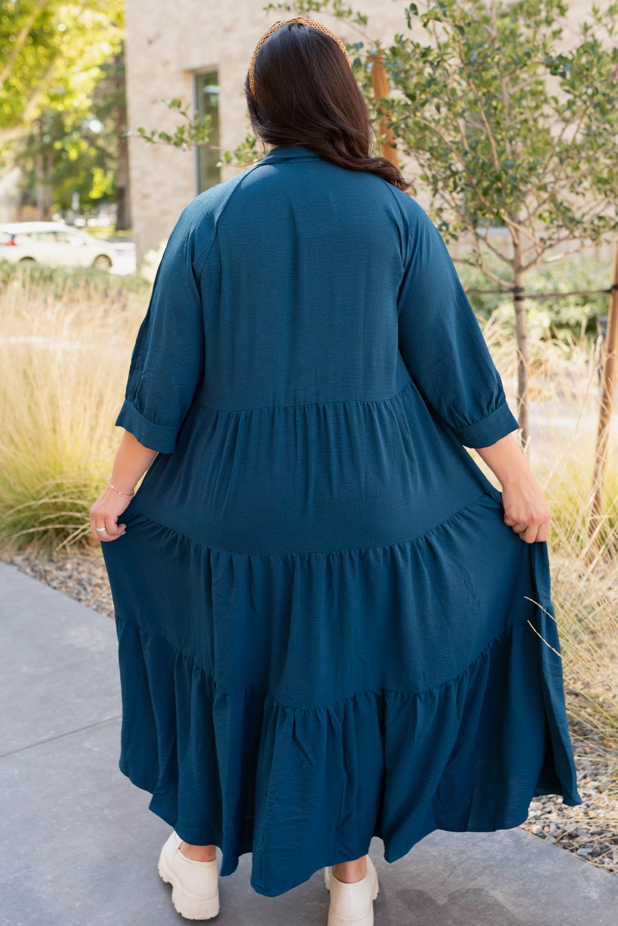 Back view of the plus size deep teal tiered dress