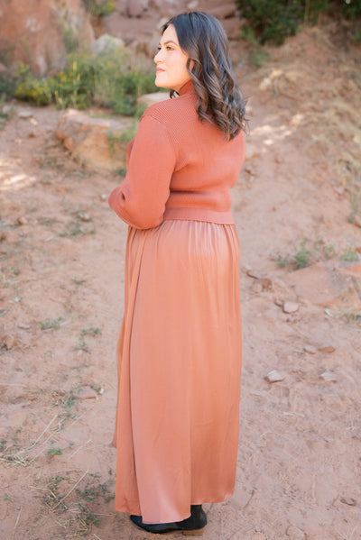 Side view of the plus size chestnut satin sweater dress