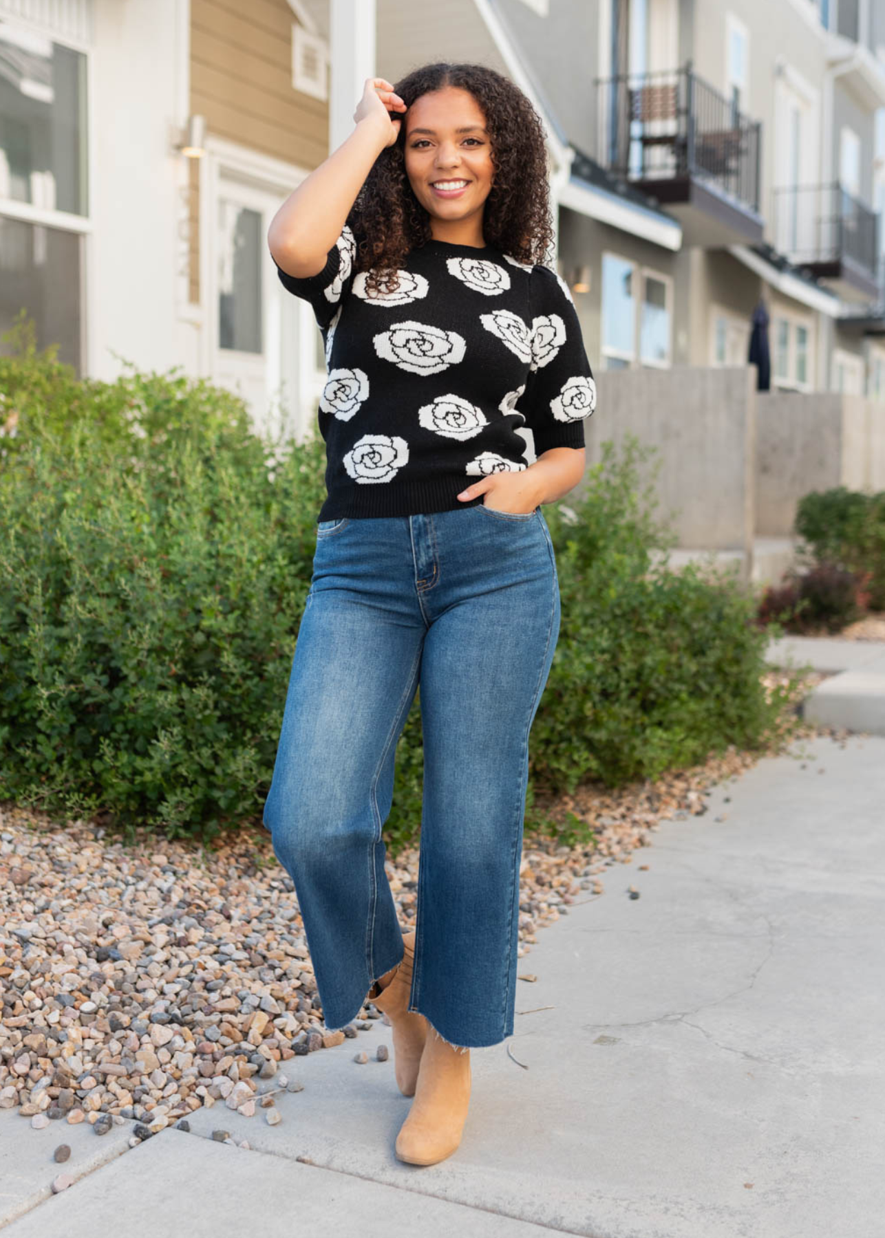 Front  view of the black floral print sweater