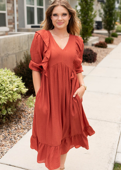 Rust midi dress with short sleeves and pockets