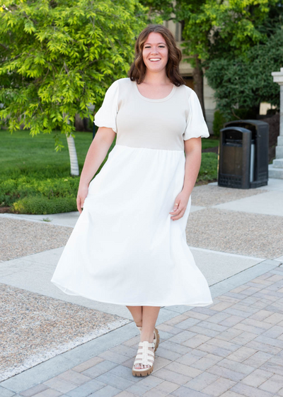 Plus size ivory knit bodice dress with white sleeves and skirt