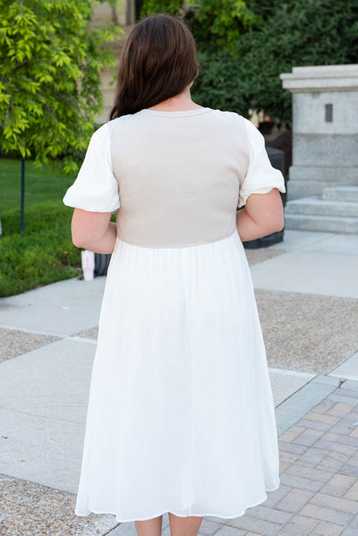 Back view of the plus size ivory knit bodice dress