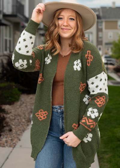 Close up of a olive cardigan