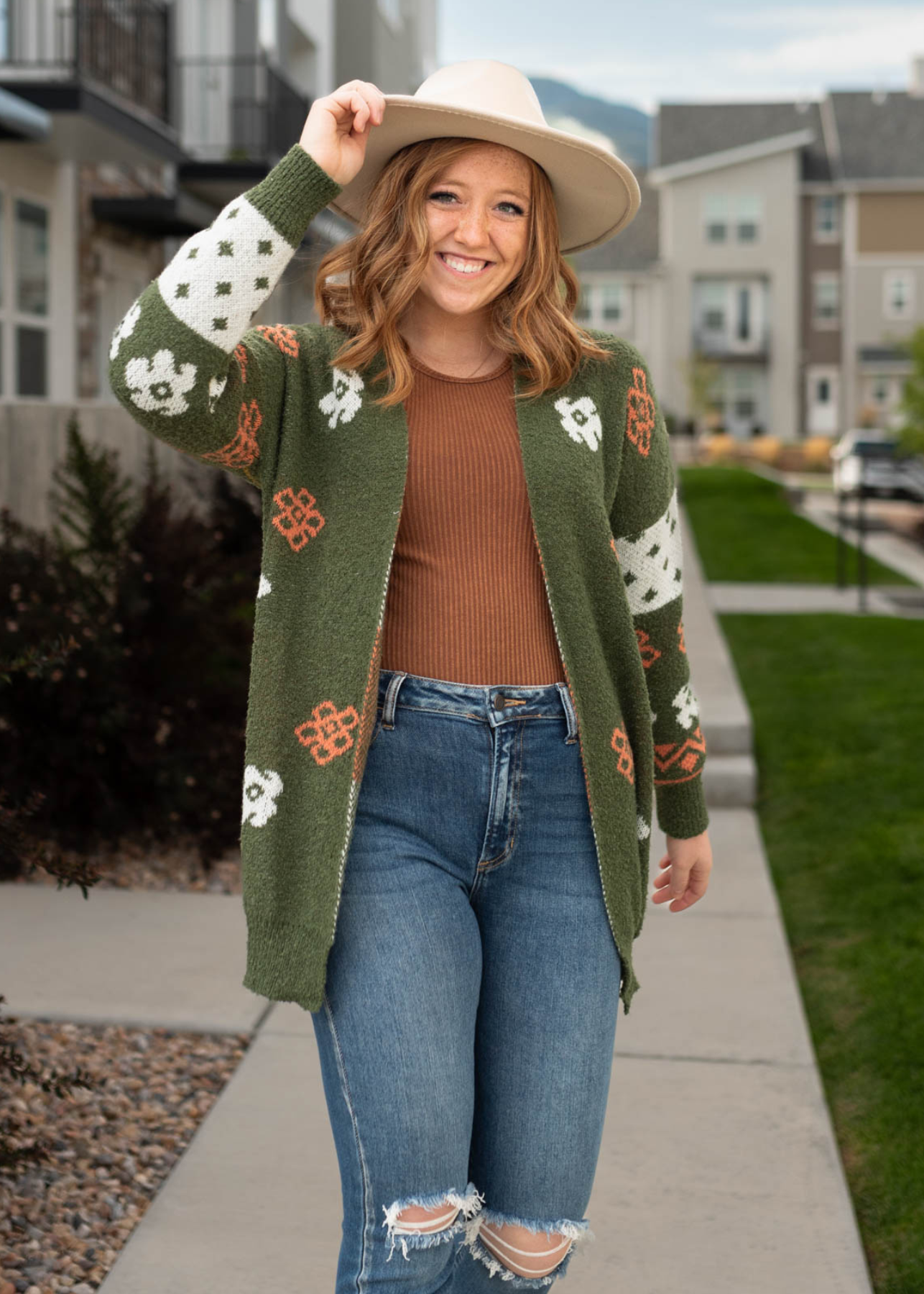 Olive cardigan with cream stripe on the sleeves