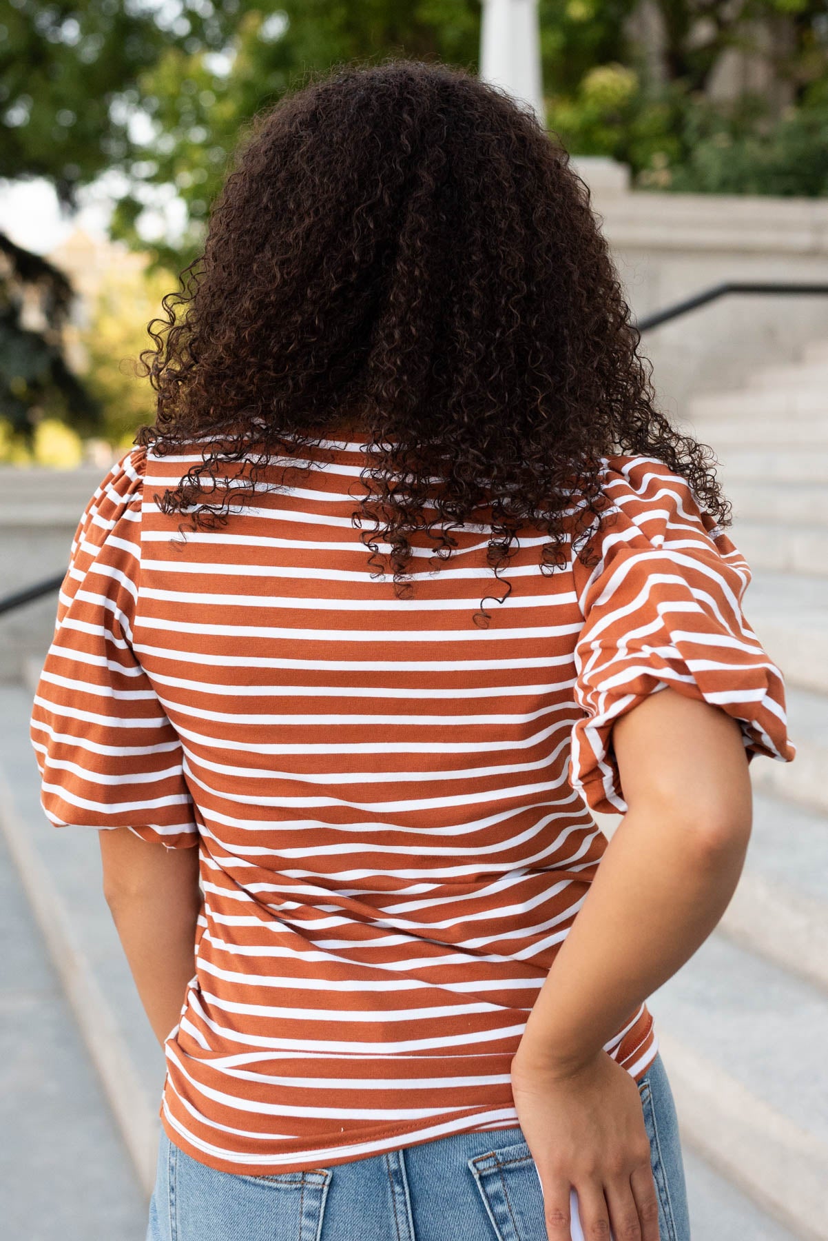 Back view of the terracotta stirpe puff sleeve top