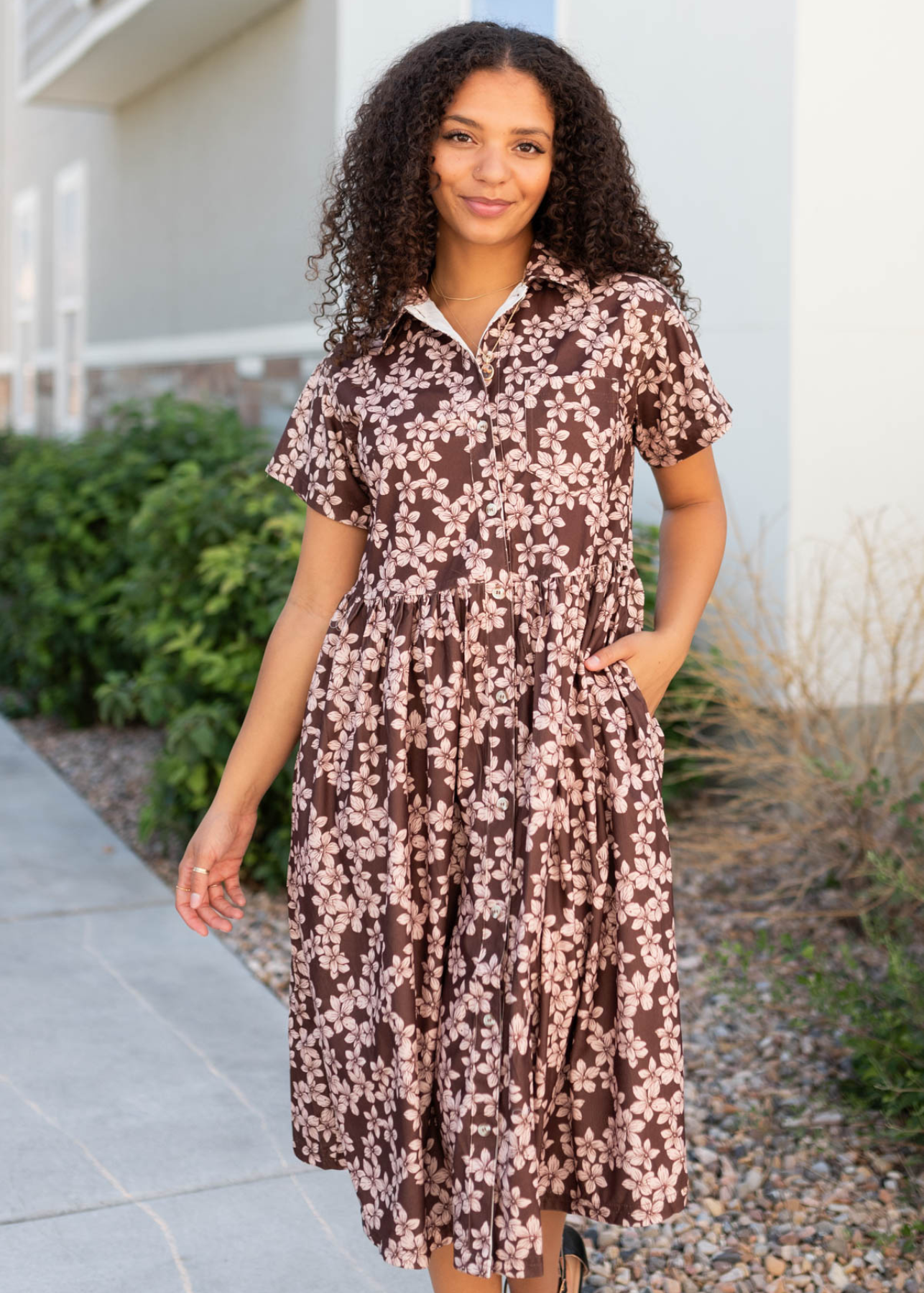 Short sleeve brown floral dress with button bodice and pockets