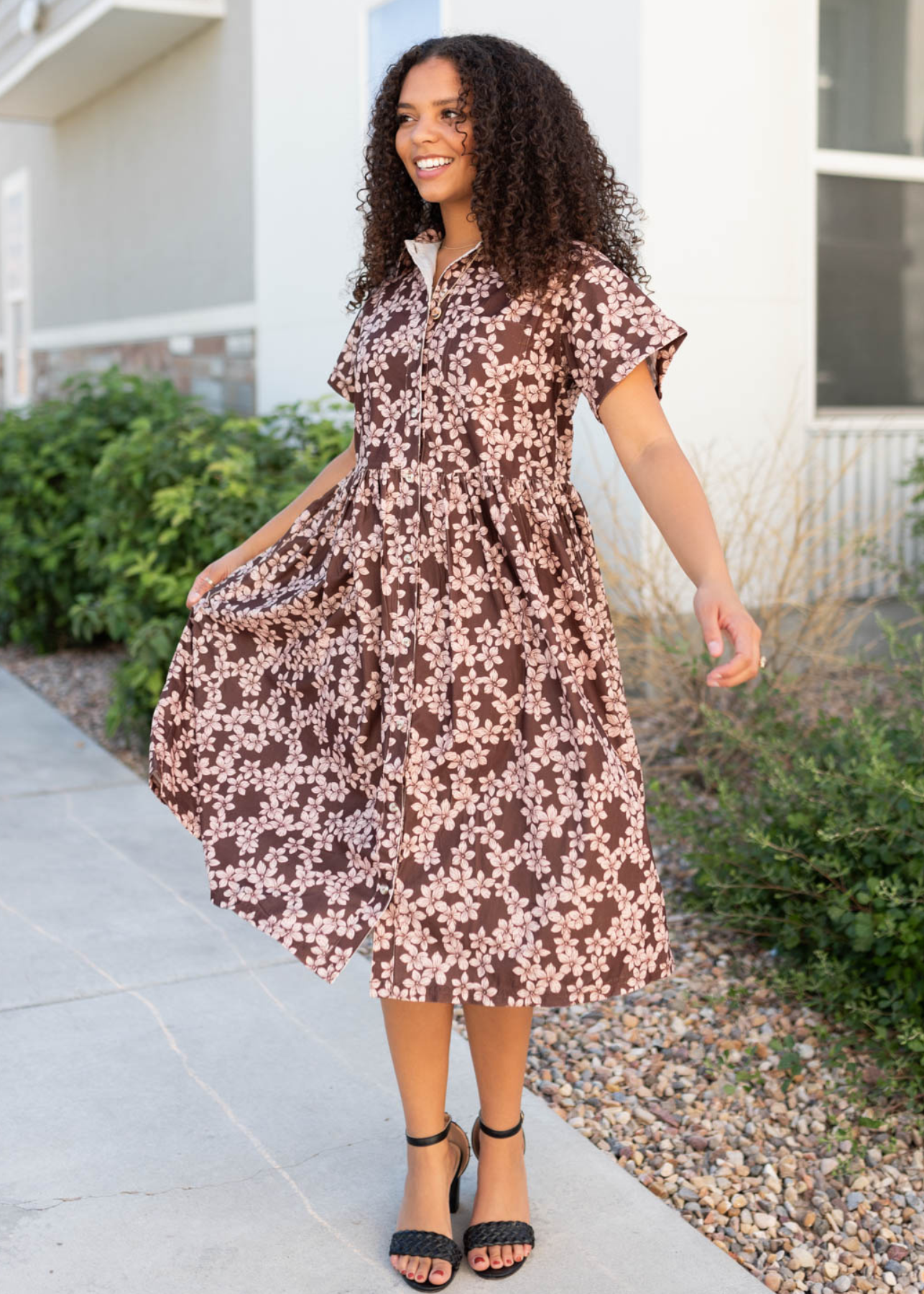 Brown floral dress with button down bodice and collar