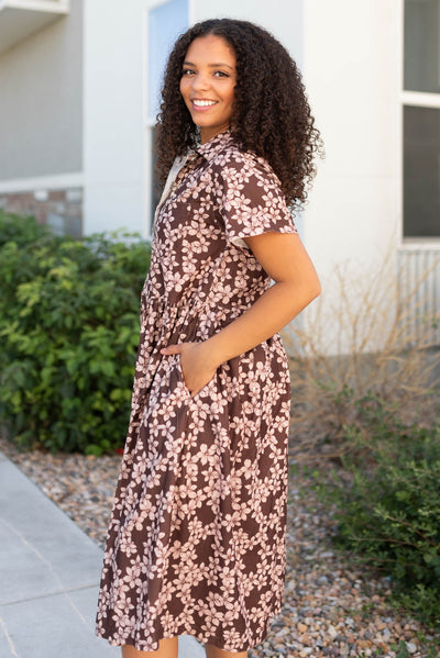 Side view of the brown flroal dress