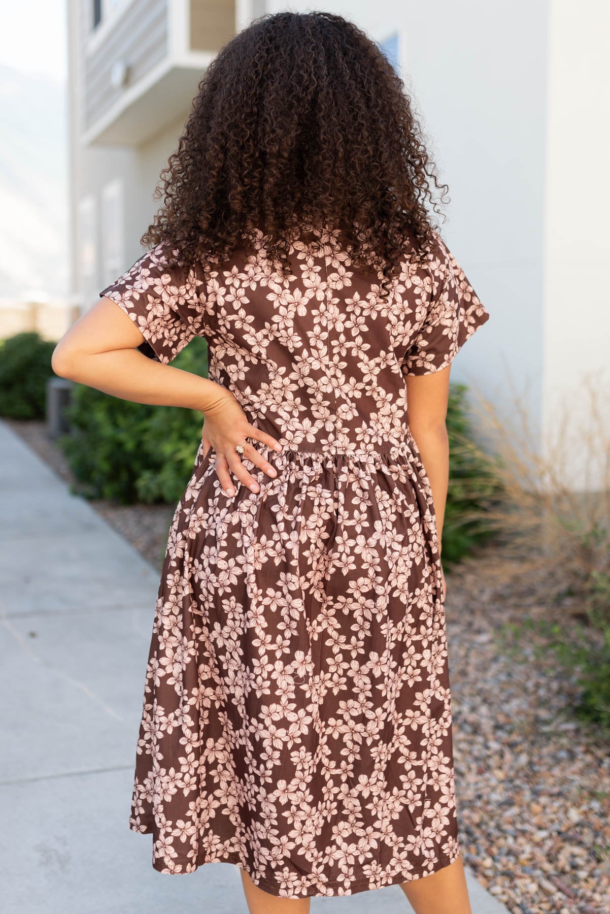 Back view of the brown flroal dress