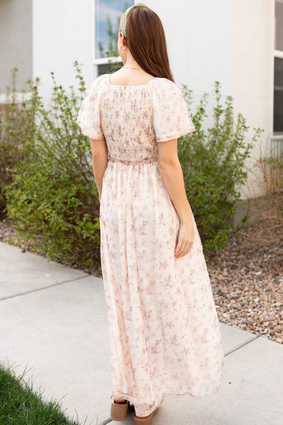 Smocking on the back of the bodice on the ivory floral dress