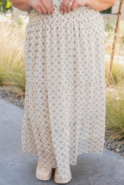 Front view of the plus size cream pattern chiffon skirt