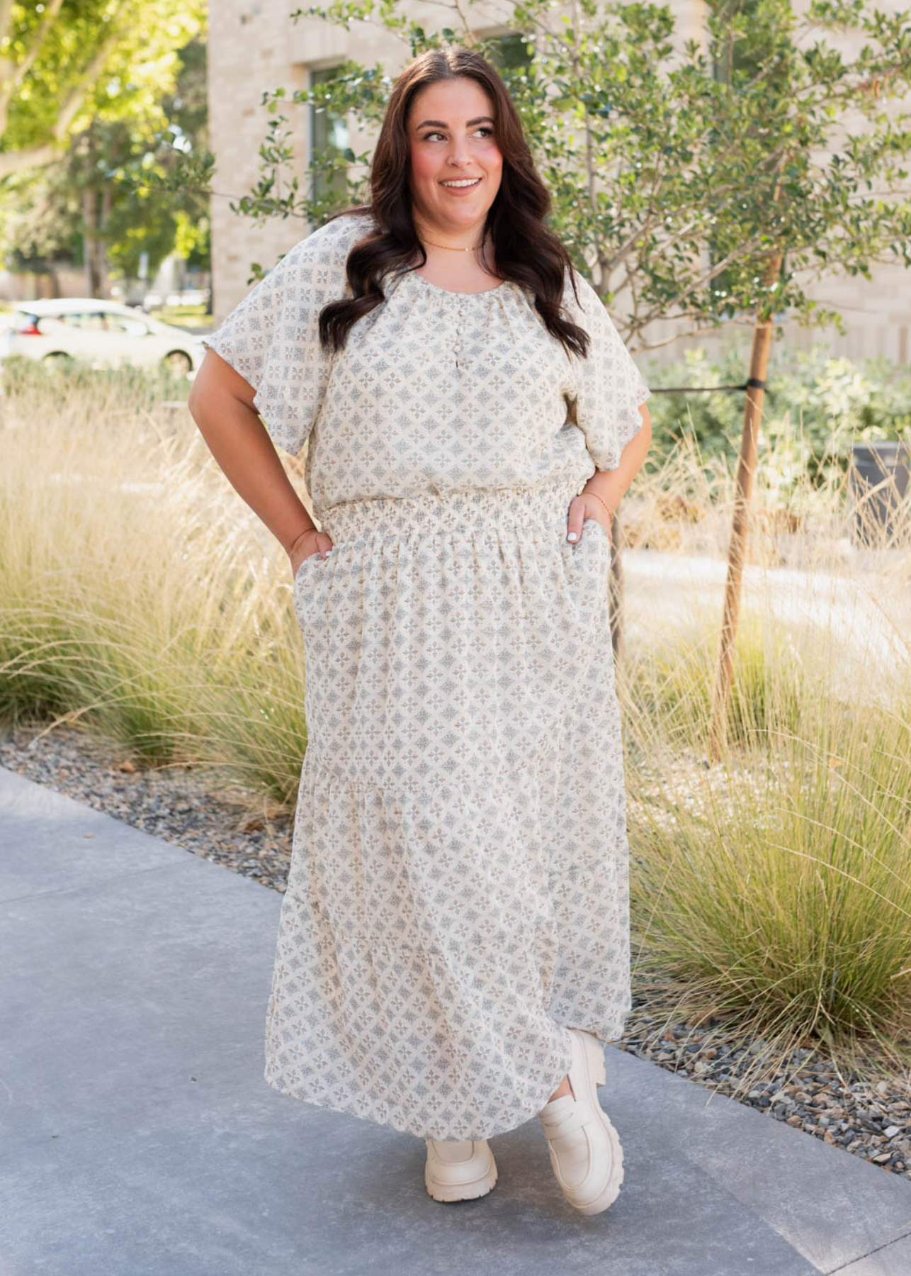 Plus size cream pattern chiffon top with short sleeves