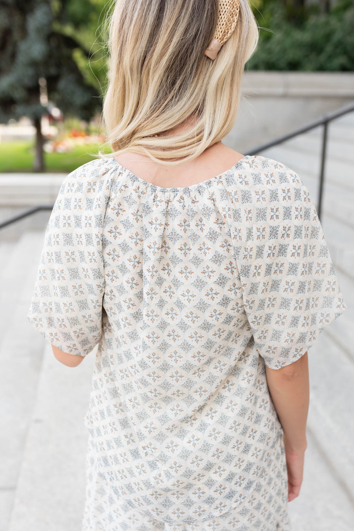 Back view of the cream pattern chiffon top