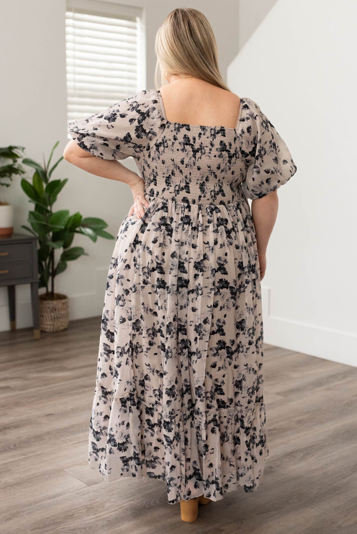 Back view of a plus size floral dress