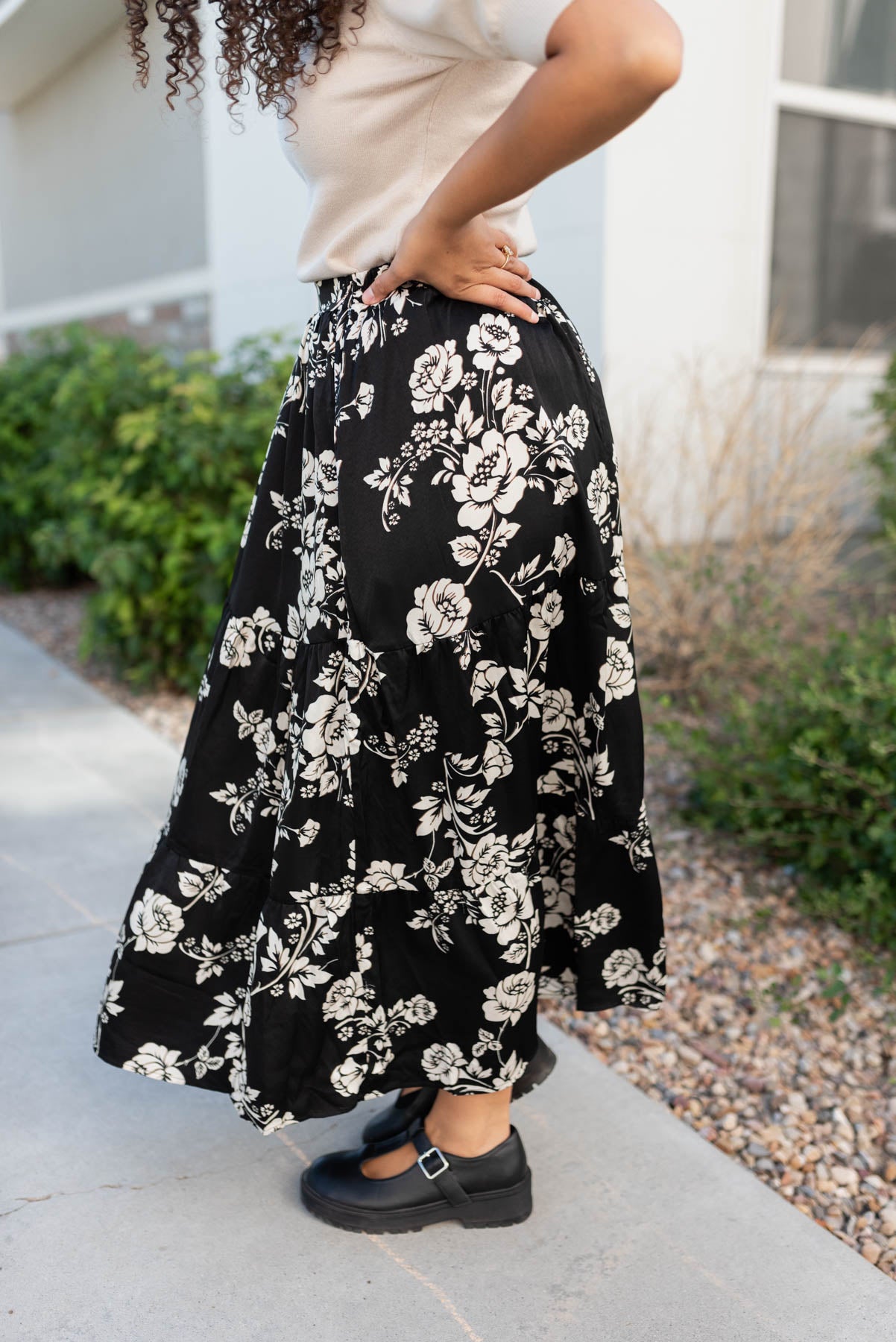 Side view of the black floral skirt