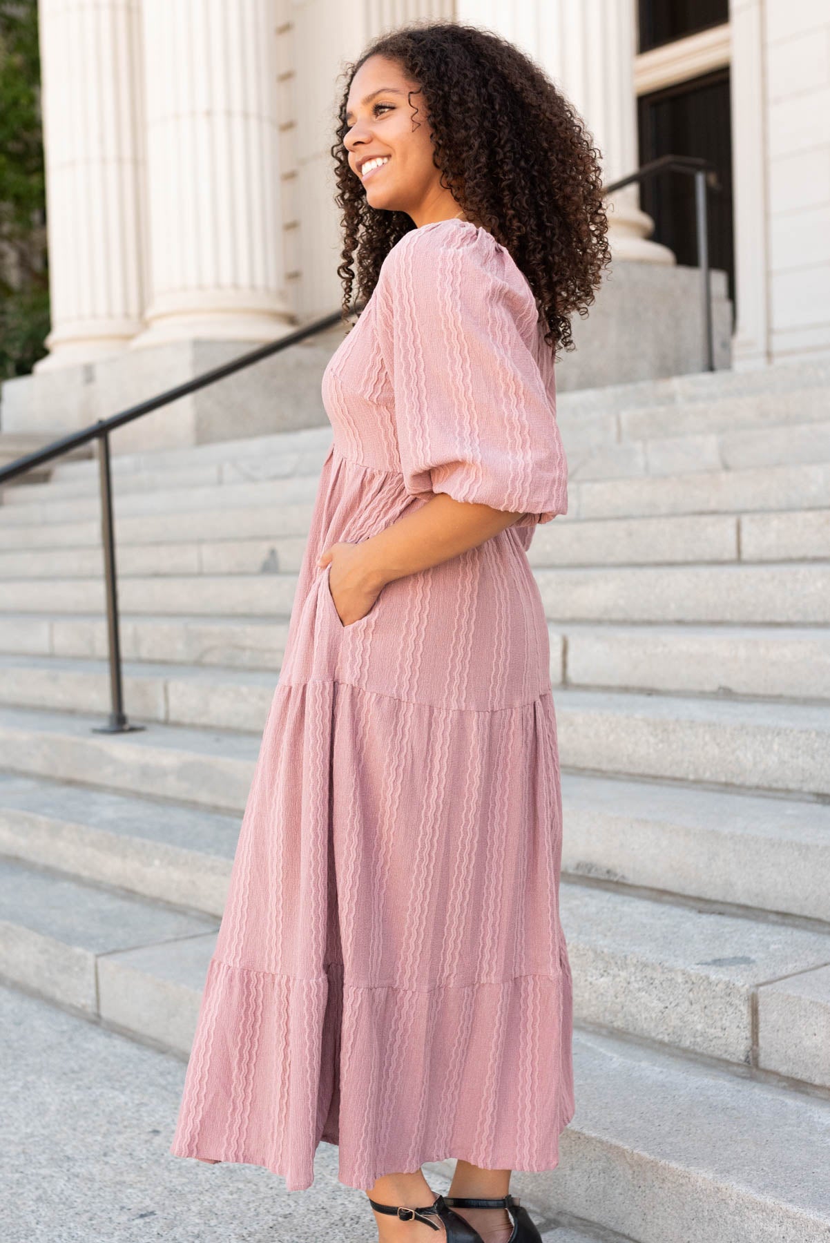 Side view of the dusty mauve textured dress