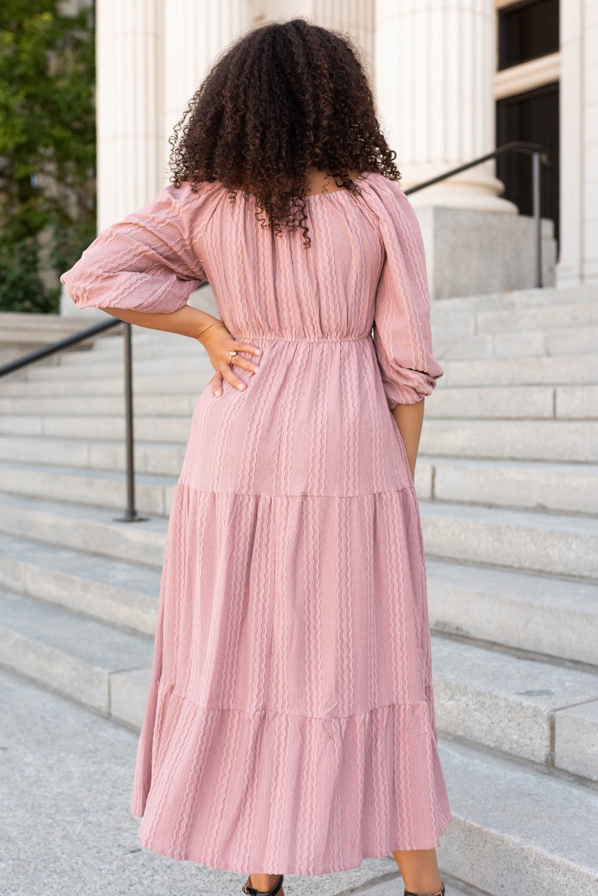 Back view of the dusty mauve textured dress