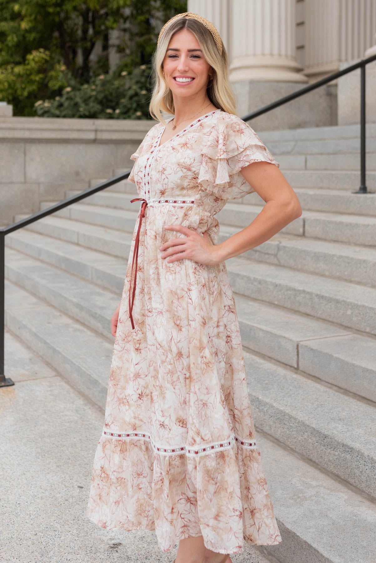 Side view of the burgundy floral lace dress