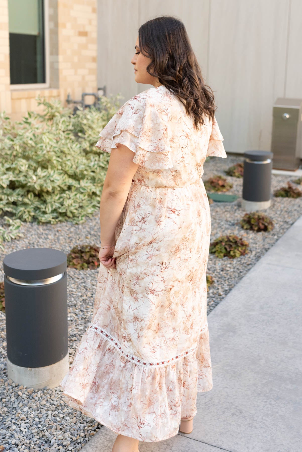 Side view of the plus size burgundy floral lace dress