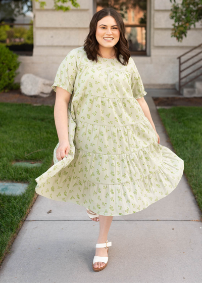 Plus size green tiered dress with short sleeves