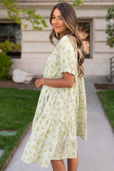 Side view of the tiered green dress