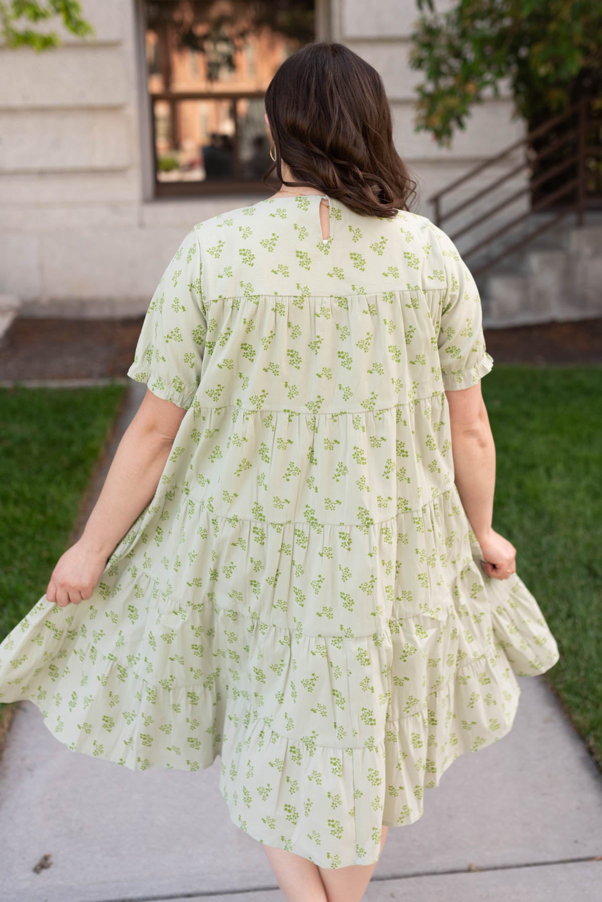 Back view of the plus size green tiered dress