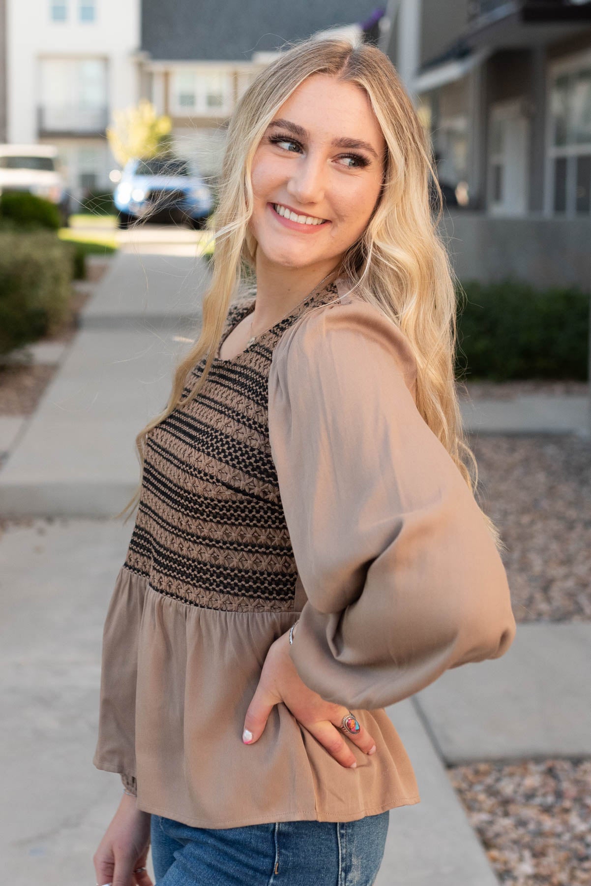 Side view of the mocha crochet stripe top