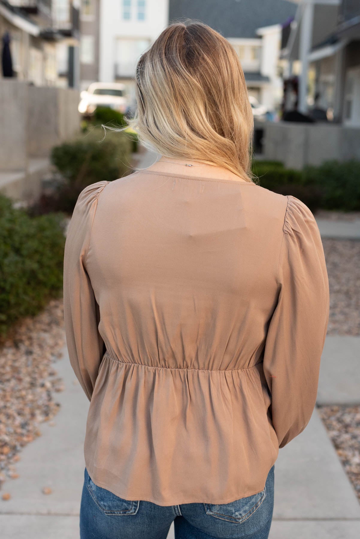 Back view of the mocha crochet stripe top