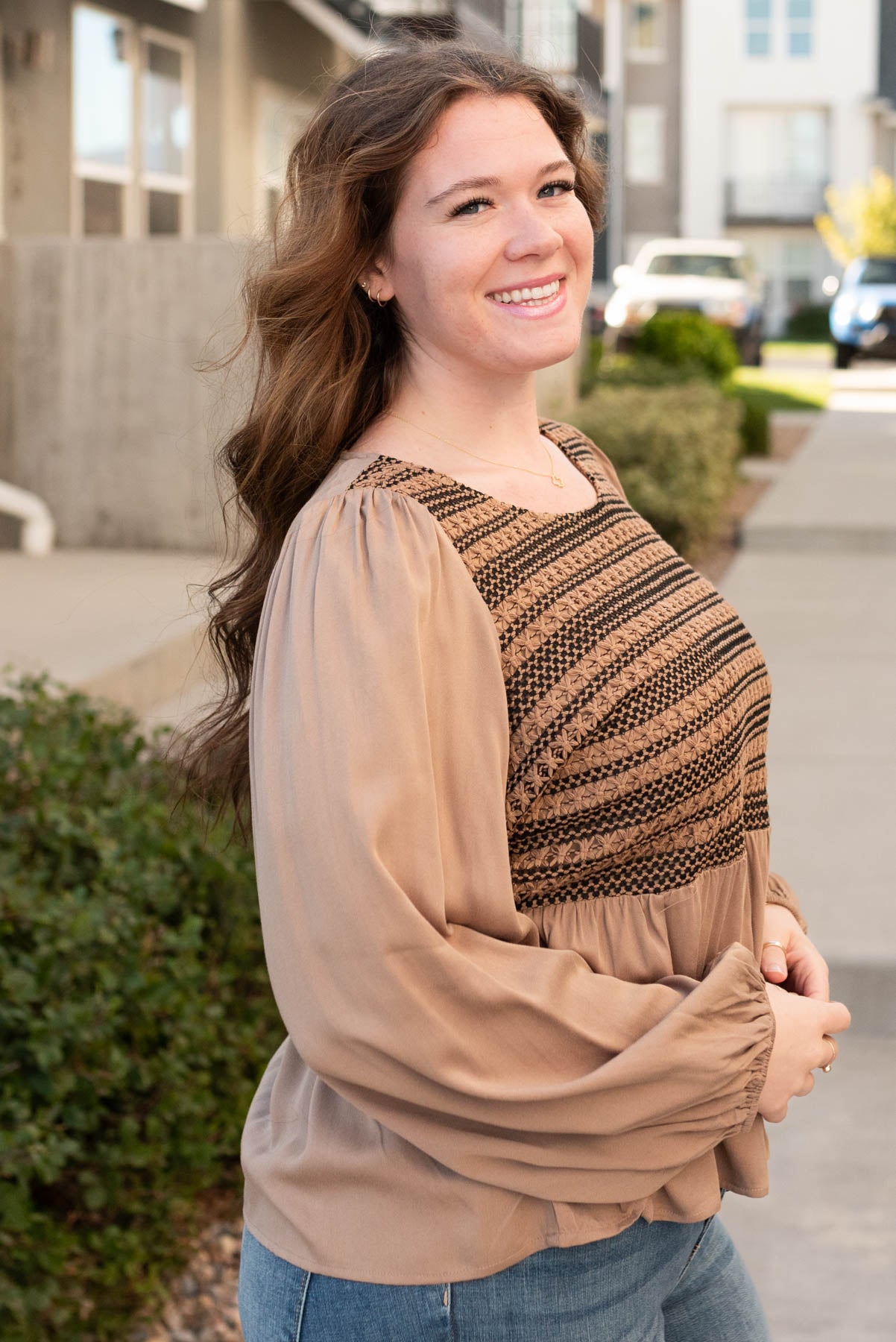 Side view of the mocha crochet stripe top in plus size